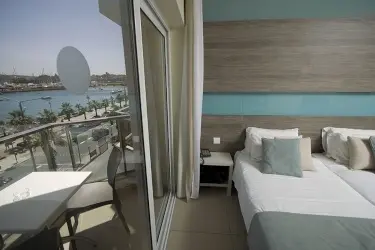 115 The Strand Hotel & Suites
